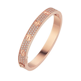 Chic Cartier-Inspired Love Bracelet with Three Row Simulated Diamonds | Iconic Design | Timeless Symbol of Affection | AAA+ Stone Quality | 925 Sterling Silver | 18kt Gold & Rose Gold Overlay |Handcrafted | Fashion Accessory | Goldhartz